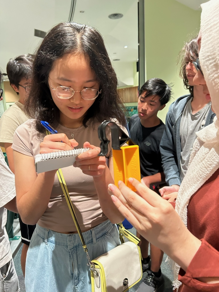 A designer sketching the blocks used in the competition.